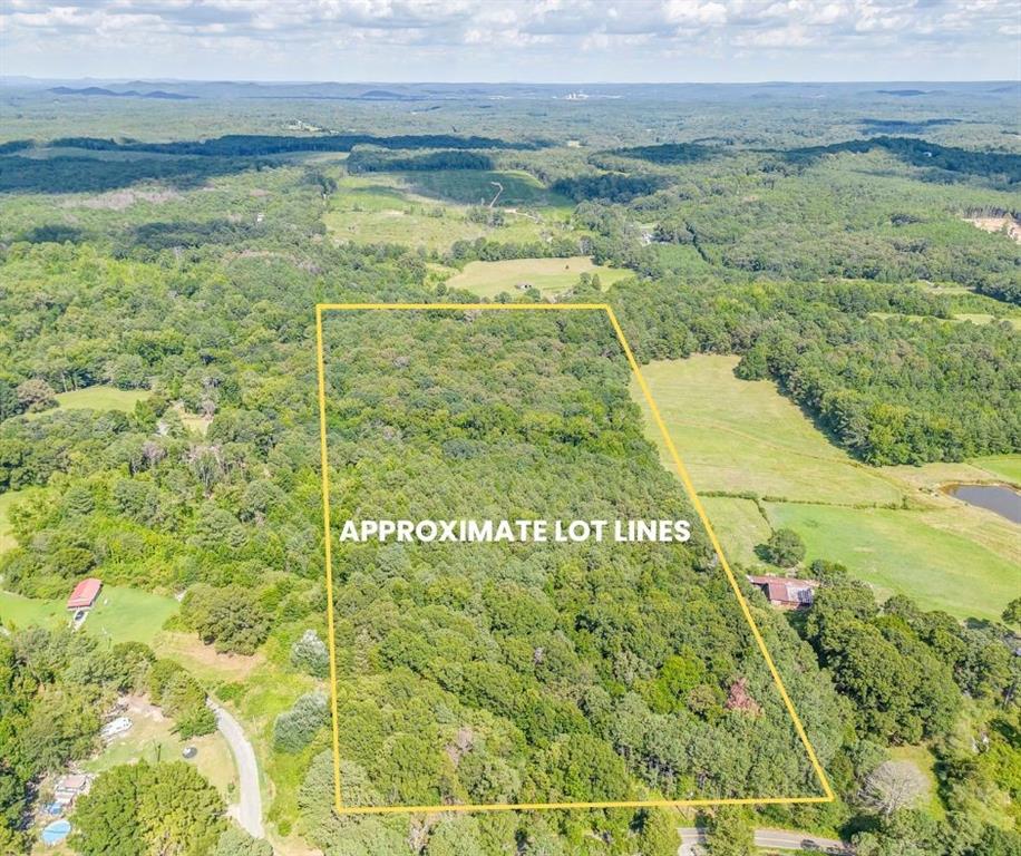 14.5-acre opportunity with road frontage and essential utilities available! This raw land tract offers power, public water, and fiber internet access at the street. With current zoning, this tract can accommodate multiple homes, this property is ideal for a small development, family compound, or your dream estate with just a new survey. Enjoy the balance of country living with modern connectivity and nearby conveniences-don't miss this rare find!