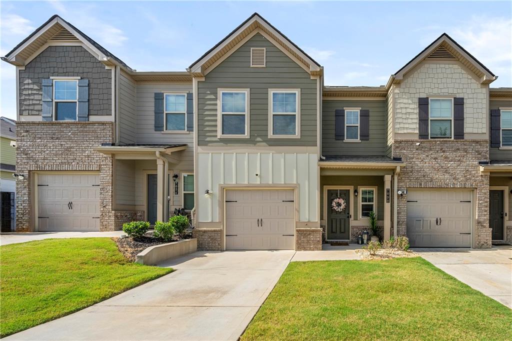 Welcome Home! This well-maintained 3 bedroom, 2.5 bath townhome with a one-car garage is the perfect blend of comfort, convenience, and style. From the moment you walk in, you’ll love the open and airy floor plan. The kitchen flows seamlessly into the dining and living areas, so you’ll never miss a moment while hosting friends or spending time with family. Upstairs, you’ll find a spacious primary suite with its own walk-in closet and spa-like primary bath with walk-in shower and linen closet. You will also find two additional bedrooms that feature generous closet space and plenty of room for that home office you’ve been dreaming of! Step outside to enjoy your private patio—perfect for morning coffee or unwinding at the end of the day. And when it’s time to head out, you’ll appreciate being just minutes from major highways, shopping, dining, and entertainment, giving you quick access to all that metro Atlanta has to offer. Whether you’re a first-time buyer, looking to downsize, or simply want a low-maintenance lifestyle in a great location, this townhome checks all the boxes. Don’t miss your chance to make it yours!