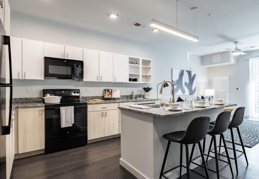 Beautiful Resort-Style Pool with Sun-Shelf Entry. Comfortable Loungers and Shaded Seating. Serene Setting Surrounded by Landscaped Grounds. Fitness Studio with Cardio and Strength Training Equipment. Free Weights and Yoga Mats. Lounge Areas with Cozy Seating, Community Library and Board Games, and Billiards Room.