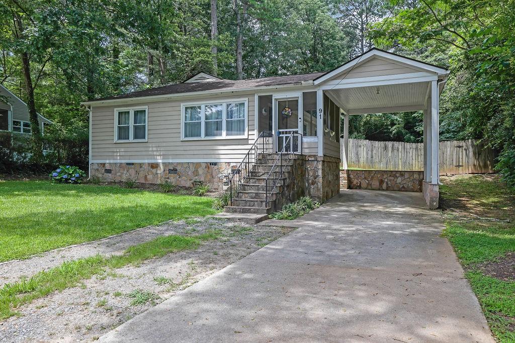This nicely updated two-bedroom, one-bathroom home blends comfort and charm with modern touches throughout. Featuring a classic floor plan, each room offers defined spaces ideal for everyday living. The updated kitchen includes stylish finishes and ample storage, while the cozy living room is perfect for relaxing or hosting guests. Step outside to a spacious, fully fenced backyard—great for pets, play, or outdoor entertaining. Enjoy summer evenings on the screened in porch! A 1-car carport provides covered parking and added convenience.