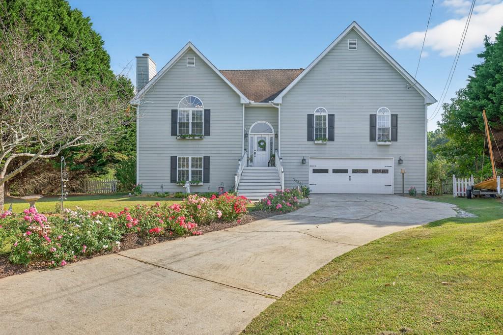 Well maintained Grayson 4BR/3BA split-level, Extensive landscaping on nearly 1-acre cul-de-sac lot! Charming lower-level in-law suite. Home has many updates and Recent upgrades: new bathroom vanities, new concrete siding, energy-efficient windows, new garage & exterior doors, Trex sundeck flooring & front entry, updated lighting, LVP & tile floors. Fireplace in living room, separate dining, and eat-in kitchen with stainless steel appliances. Bonus Room on Lower Level which could be used as home office with separate entrance. Security cameras, generator & ROBO mower included, Great family-friendly neighborhood, close to shopping, dining & parks move-in ready!