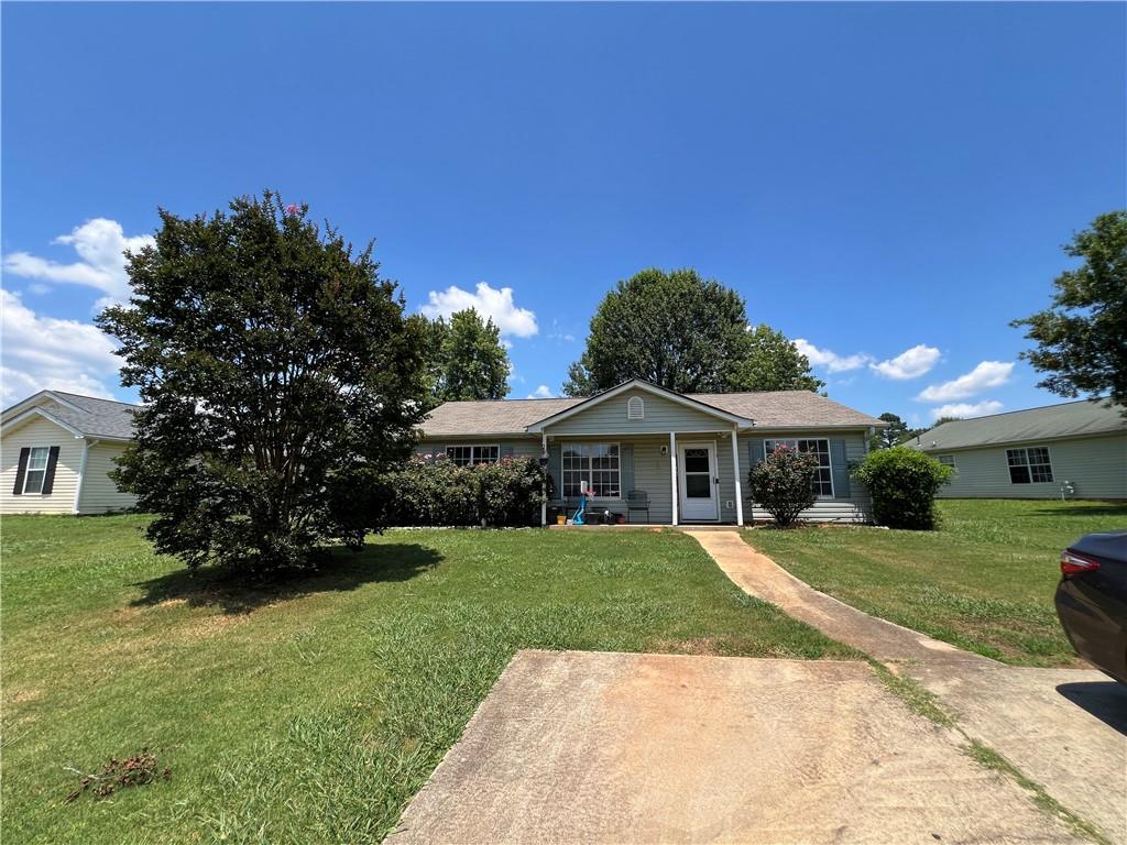 Don't miss your chance to view this home and see the system and flooring updates which will keep money in your pocket over the next few years. The roof is approximately 7 years old and is in good condition. The HVAC was replaced in 2021 and provides great cooling and heating efficiency. LVP flooring is present in the main living areas. Enjoy being outside on the covered front porch or grilling on the back patio. Bring your dreams and freshen this home to meet your desires. Adding a few of your touches to this home, at this price point ,and you will immediately gain equity. Options are available for addressing repairs.