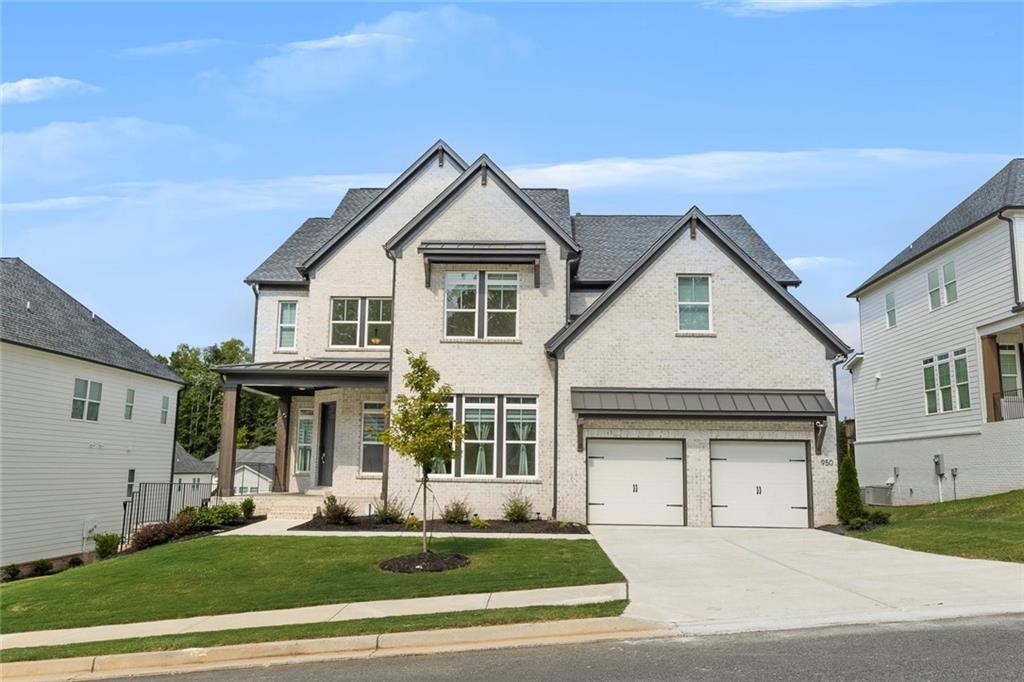 The stunning Hendricks floorplan, part of the Highland Collection in the sought-after Vista Ridge community, offers elegance and functionality in a prime Woodstock location. Perfectly positioned between Downtown Woodstock, Downtown Roswell, and Crabapple, this master-planned community provides both convenience and lifestyle. The distinctive Hendricks welcomes you with a charming front porch and soaring two-story foyer that opens to a spacious dining room. A private flex space or office is located just off the entry. The expansive two-story great room, highlighted by a striking tile-surround fireplace, flows seamlessly into the well-appointed kitchen and casual dining area. From here, enjoy access to the rear deck, ideal for morning coffee or evening grilling.
The chef’s kitchen features a large center island with breakfast bar, abundant upgraded cabinetry and countertops, and a premium 36" KitchenAid gas cooktop. A secluded first-floor bedroom with full bath provides the perfect guest retreat, while the owner’s entry from the two-car garage—complete with an electric car charging outlet—adds everyday convenience. Upstairs, the private owner’s retreat impresses with a tray ceiling, generous walk-in closet, and a luxurious spa-inspired bath with dual vanities, soaking tub, glass-enclosed shower, and private water closet. Secondary bedrooms include one with a private bath and two sharing a hall bath, each with walk-in closets. A centrally located laundry room with sink and storage completes the upper level. The full, unfinished walkout basement offers endless possibilities for future living space. This spectacular home has over $200,000 in new construction upgrades, please refer to the information sheet in documents for a complete list. Residents of Vista Ridge enjoy resort-style amenities including a clubhouse, pool, cabana, Cornhole court, and playground. With recreation, shopping, dining, and entertainment just minutes away, this home blends upscale living with an unbeatable location.