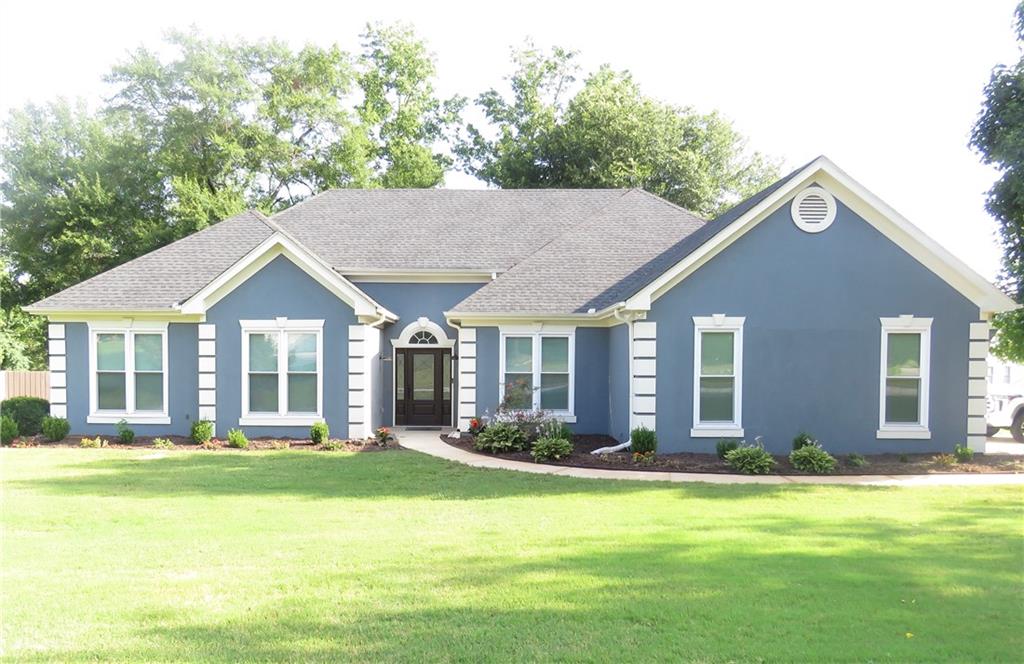 Welcome to your beautifully updated ranch-style oasis, nestled on a prime corner lot in a desirable neighborhood. This spacious 4-bedroom, 2.5-bathroom home blends modern elegance with classic charm, offering an ideal blend of comfort and style.
Step inside to discover an open-concept living space bathed in natural light, enhanced by newly installed LVP floors and fresh paint throughout. The gourmet kitchen features sleek black granite countertops, black stainless steel appliances, and updated cabinetry, perfect for culinary enthusiasts and entertaining alike.
Relax and unwind in the generous master suite, boasting a luxurious en-suite bathroom with dual vanities and a large open shower. Three additional bedrooms provide ample space for family, guests, or a home office, each thoughtfully designed with LVP and ample closet space.
Outside, the expansive corner lot offers endless possibilities for outdoor enjoyment, whether you're hosting gatherings on the patio or enjoying quiet evenings under the stars. A wonderfully landscaped yard and mature trees provide shade and a serene backdrop.
Located in a highly sought-after neighborhood in Ellenwood, this home combines convenience with the tranquility of suburban living.
Don't miss your chance to own this immaculate, move-in ready home. Schedule your private tour today and experience the beauty and comfort firsthand!
This home has many upgrades: New windows throughout (warrantied), Roof is only 6 years old, LVP throughout, fully updated bathrooms and kitchen, fresh paint throughout. Home is owned by listing agent