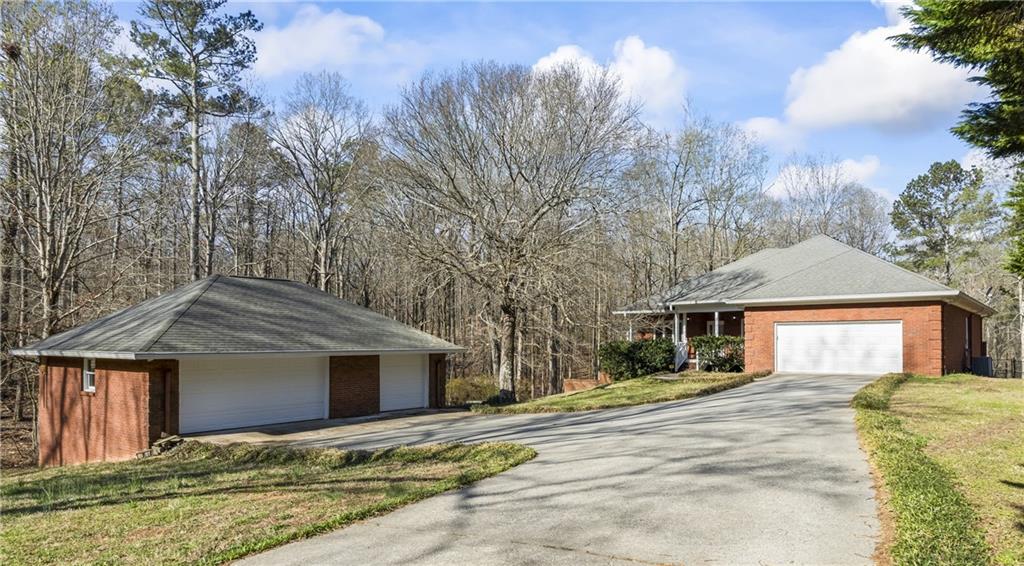 5595 Rolling Acres Lane, Cumming, Georgia image 1