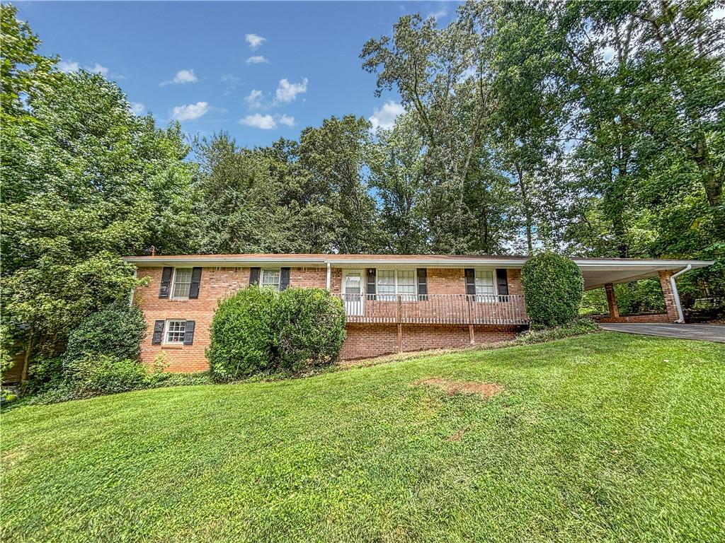 Available Now! Spacious brick ranch has just been renovated. New Appliances, Fresh Paint, New Plank Flooring in Liv Rm / Kitchen, New Light Fixtures and More. Spacious open plan with Kitchen open to living and dining spaces. Large Master Bedroom with New Carpet and New Bathroom Vanity. Two Guest Bedrooms with Hardwood Floors. Full unfinished basement for storage or crafts. Laundry and Storage room off 2-Car Carport. Great oversized deck overlooks private backyard.
Resident Benefit Package included. Rent quoted reflects discount for on time payment, ask for details. Check out our 5-Star reviews on Google