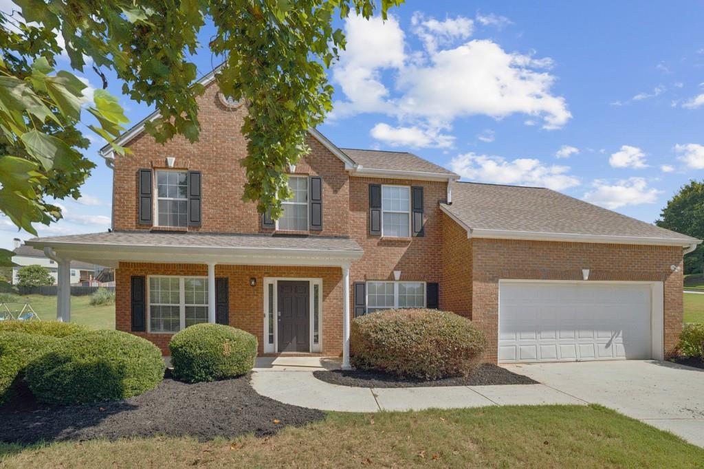 This beautifully maintained home is nestled on a generous corner lot in one of Conyers' most desirable communities with amenities. From the moment you arrive, you'll appreciate the curb appeal and move-in ready condition--with a brand-new roof and only minor touch-up paint needed to make it truly shine. Step inside to find luxury vinyl plank flooring throughout, including the stairs and all bedrooms--blending durability with modern style. The thoughtfully designed floor plan offers a formal living and dining room, perfect for entertaining or family gatherings. The heart of the home is spacious galley-style kitchen featuring tall 42"cabinets, ample counterspace, and views into the main living room and breakfast area--ideal for seamless everyday living. Step just outside the kitchen to a cozy covered patio, great for enjoying your morning coffee or winding down in the evenings. Upstairs, the bright and airy primary suite is a true retreat, complete with a sitting nook, large walk-in closet, and a spa-like en-suite bathroom with a double vanity, soaking tub, and separate shower. Located in a well-kept neighborhood with community amenities and easy access to local shopping, dining, and commuter routes, this home check all the boxes. Don't miss your opportunity to own this move-in ready gem in Conyers--schedule your showing today!