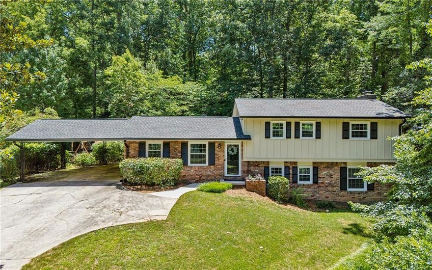 Now offered at a new, lower price, this spacious and well-maintained split-level in Brookhaven’s established Oak Forest neighborhood is the perfect chance to secure more square footage, convenience, and value before year-end. Whether you're a first-time buyer, investor, or looking to upsize, this home checks all the boxes in a location that delivers.
Over 2,000 sq ft of flexible space with a newer roof, HVAC, fresh interior paint, brand-new carpet, a cozy fireside family room, and a well-designed kitchen ready for your personal touch. The layout includes three bedrooms up and a fourth bedroom with bath on the daylight terrace level, perfect for guests or multi-use space.

Outside, a charming patio and deep, tree-lined backyard where deer sightings are a daily treat. The two-car carport doubles as shaded game-day space, with an additional parking pad for convenience.

All located just minutes from Montgomery ES, Chamblee MS & HS, Marist School, and the new Publix at Cambridge Square. With over 100 restaurants within a 2–3 mile radius and easy access to I-285 and GA-400, this home is positioned for both lifestyle and long-term upside.

Don’t miss this Q4 value play in one of Brookhaven’s most accessible and desirable communities!
