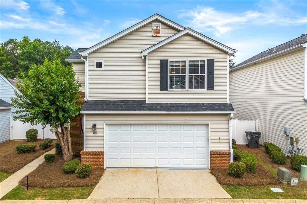 Welcome to this well-maintained 3-bedroom, 2.5-bathroom home located in the desirable Windcroft neighborhood of Acworth. Situated on a private road in a highly walkable community with a peaceful loop perfect for evening strolls, this home offers both comfort and convenience. The main level features an open, light-filled floor plan with LVP flooring, a gas fireplace, and built-in bookshelves that add warmth and function. The kitchen is equipped with stainless steel appliances and flows seamlessly into the living and dining areas, ideal for everyday living and entertaining. A half bathroom on the main level adds flexibility for guests. Upstairs, you'll find the spacious primary suite, two secondary bedrooms, and an additional full bathroom. The fully fenced backyard includes a privacy fence and fresh pine straw, offering a clean, low-maintenance outdoor space. The HOA maintains the front yard, and the quiet neighborhood features two community green spaces with gazebos. Conveniently located close to top-rated schools, shopping, dining, and commuter routes, this home checks all the boxes for location, layout, and lifestyle. 0PEN H0USE SATURDAY 6/28 12:00-2:00!