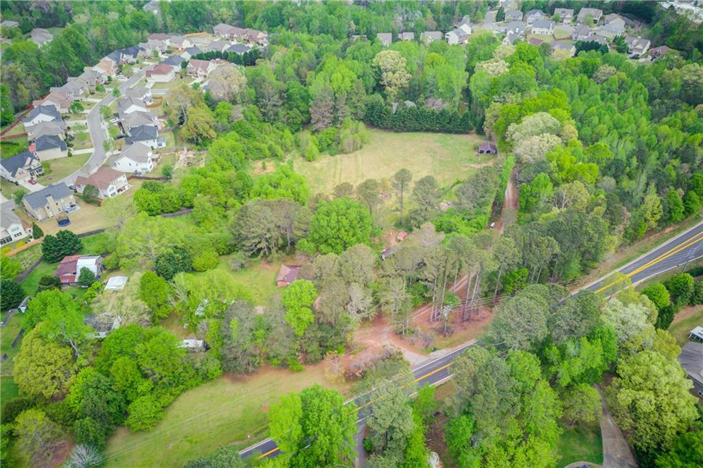 11.47 +- Total Acres are assembled together for sale. The total list price is $4,530,650.00. The assemblage is made up of 2 parcels that will not subdivide. Parcel #: 083 026 is 5.47 +- AC & Parcel #: 083 069 is 6 +- AC. The zoning is Ag-1. The property is being marketed as potential commercial. Forsyth County will allow the purchaser to apply for rezoning to Commercial Business District, O&I, & Residential. It is the buyer's responsibility to check with Forsyth County on all rezoning requirements. There is approx. 517 +- Feet of road frontage on Castleberry Rd. Sewer is located behind the property approx. 300 feet as a distance estimate. The homes will not be viewed at the initial showing, as the value is in the land. You must have a scheduled confirmed appointment to view the property. Do not disturb the owners.