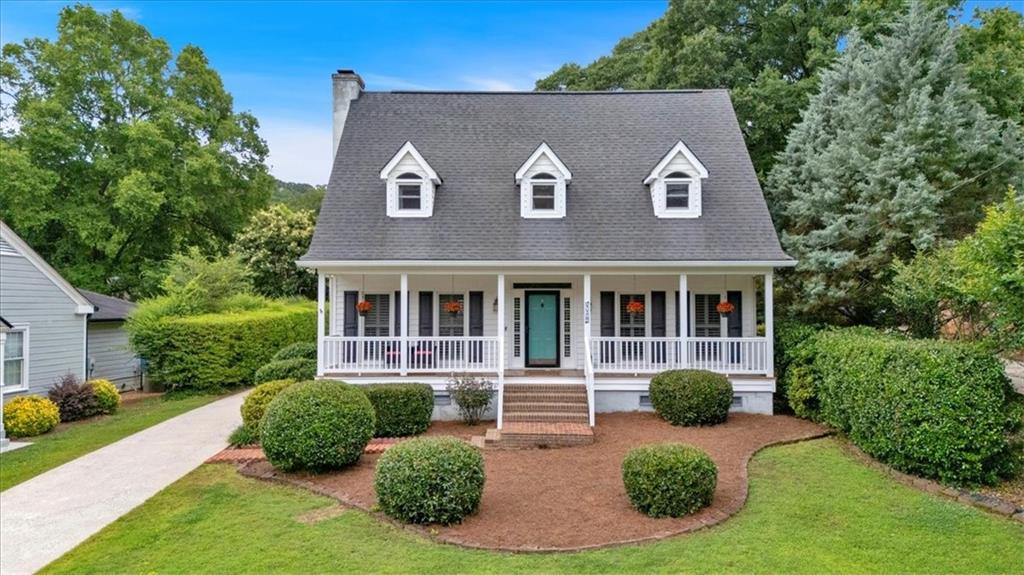 Welcome to this charming Southern Cape Cod home in sought-after Old East Rome, just minutes from downtown. A full-length covered front porch with rich wood flooring sets the tone. Inside, the primary suite is conveniently located on the main level. The galley kitchen features granite countertops and a window that looks into the sunroom, flowing seamlessly into the dining and living areas. The living room boasts a wood-burning fireplace and built-in shelves. Upstairs, you'll find two bedrooms and a spacious family room perfect for games or movie nights, plus a fourth bedroom on the top level. Enjoy relaxing evenings under the oversized covered carport. Call today for your private showing!