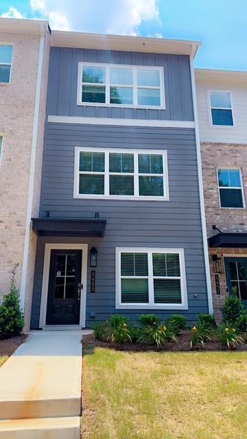 The Dogwood plan built by Create Homes. Quick Move-In! Enjoy the convenience of a location close to shopping, dining, Mable House Amphitheater, Silver Comet Trail, Hartsfield-Jackson International Airport, I-285, I-20, I-75 and the East-West Connector. This stunning new residence seamlessly blends contemporary style with functional living, creating a space that elevates your everyday. Enter on the terrace level, where a flexible space can serve as a private retreat, home office, or guest bedroom, complete with closet and full bath. Up the stained oak stairs, the open-concept main level offers a modern kitchen featuring stylish granite countertops, stainless steel appliances, a spacious island, and soft-close cabinets and drawers. This space seamlessly flows into the dining and living areas, making it ideal for both everyday living and entertaining. A private rear deck extends your living space, providing a great spot to unwind and enjoy the outdoors. On the third level, the primary suite offers a spacious retreat with a double vanity, a walk-in closet, and modern hardware and fixtures for a sleek, contemporary feel. The laundry room is conveniently located nearby, and a secondary bedroom with a full en-suite bath completes this floor. Built by Create Homes, this energy-efficient townhome features smart home technology and quality construction. Thoughtful details like modern black hardware and fixtures throughout enhance the home's style. Conveniently located near highways, hospitals, airports, and parks, this home offers both comfort and convenience. Make The Dogwood your dream home today! Ask about $$ Closing Cost contribution with binding contract by 07/31/2025 with preferred lender only.
