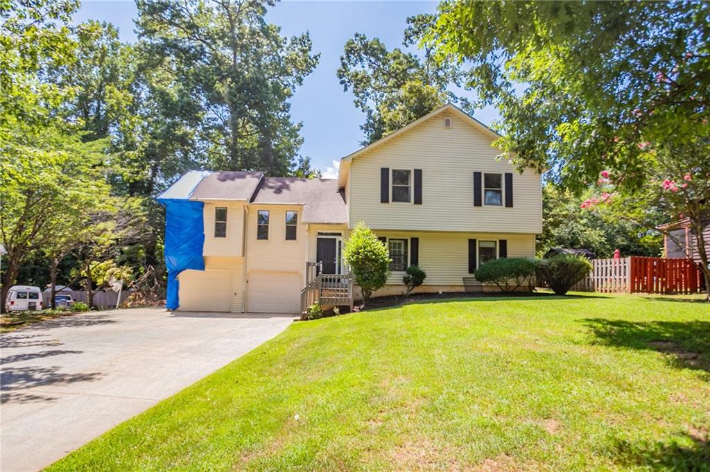 Investor special! This 3-bedroom, 3-bathroom home offers a unique opportunity for a full renovation. Some areas of the roof are missing, and sections of the ceiling have been compromised, but with vision and repairs, this property has the potential to be restored into a spacious and valuable home. Ideal for experienced investors or renovators looking to bring a home back to life. Schedule a showing today!