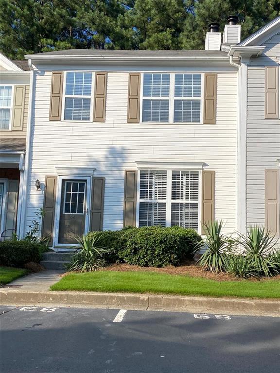 Don’t miss this incredible opportunity in the desirable Dolvin/Autrey Mills/Johns Creek HS school district! This stunning 2 bed, 2.5 bath townhome offers the perfect blend of elegance and convenience. Enjoy a prime location near shopping, hospitals, restaurants, and parks. Inside, laminated floors lead to a spacious living room with a cozy gas-burning fireplace. The bright kitchen features a gas stove, microwave, refrigerator, and dishwasher, plus plantation shutters that open to a private back patio—perfect for grilling! Upstairs are two generous bedrooms, each with its own bathroom ideal for roommates or guests, along with convenient upstairs laundry. Washer and dryer are staying. This remarkable home is waiting for you!