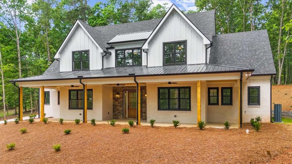*Up to $3000.00 in lending credit when preferred lender Jodie Bochat with Homeowners Financial Group is used* Welcome to one of the final opportunities to own a brand new home in the established and highly desirable Laurel Place Subdivision! This stunning 4-bedroom, 4 full and 2 half-bathroom home offers over-the-top quality and design in a neighborhood known for its charm and convenience. This beautifully crafted residence features high-end finishes throughout, a main-level primary suite, and two large finished bonus rooms upstairs, providing plenty of flexible living space. Also on the main level is an additional primary suite, office, walk-in pantry, oversized laundry/mud room, and large covered back porch. Enjoy the convenience of Trailwave Fiber internet, a total electric home, and a low HOA-modern efficiency meets smart, low-maintenance living. Located just minutes from Highway 365, top-rated schools, and everyday shopping, this home offers the perfect blend of comfort, quality, and location. Don't miss your chance to own new construction in an already thriving community-schedule your private showing today! Up to $3000 lending credit available if preferred lender is used.