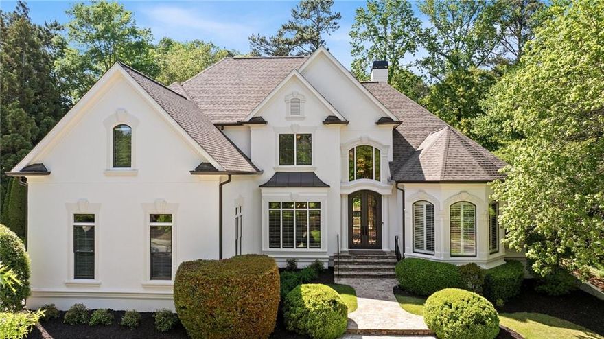 Tucked into a quiet cul-de-sac street within one of Suwanee’s most prestigious 24/7 guard-gated communities, this executive showpiece blends luxury with thoughtful functionality and convenience. It offers a rare combination of security, top-tier schools, and is just steps away from resort-caliber amenities, all within one of North Atlanta’s most desirable lifestyle settings. Privately positioned along the 15th fairway of the Jack Nicklaus-designed golf course, you're met with scale and substance from the moment you enter through the elegant oversized entry doors. The foyer opens to a formal dining room and a private study, while just beyond lies a two-story, fireside great room anchored by a breathtaking wall of windows giving you unobstructed views of the patio, foliage and golf course.  

Upgrades include a new roof & gutters, newly painted hardcoat stucco exterior, 2024 kitchen renovation, newer HVACs and water heaters, replaced windows and more.

At the heart of the home, a transformed kitchen is outfitted with quartz countertops, 5-burner KitchenAid cooktop, double ovens, warming drawer and whisper-quiet Bosch dishwasher.  The space is designed for everyday ease and relaxation as it opens to a breathtaking vaulted family room that features one of the homes 4 fireplaces.

 The main-level primary suite is a quiet retreat with fireplace, dual vanities, expansive custom closet, and a soaking tub. Upstairs, each secondary bedroom features an en-suite bath, offering privacy and comfort for guests and family members. 

The finished terrace level offers incredible flexibility, with a home theatre, home gym, kitchenette, full bath and multiple entertaining zones — ideal for hosting, working, or multi-generational living. 

Outdoor living is designed for enjoyment and is only a few steps off the main level making entertaining convenient and effortless.  Spacious flagstone patio, multiple lounging areas, fireplace and saltwater pool with jacuzzi. Located minutes from award-winning schools, elite healthcare, and the best of Suwanee’s shopping and dining (including the brand new Medley development), this home offers more than just stunning design — it delivers elevated living and lasting enjoyment.  Schedule a tour today.
