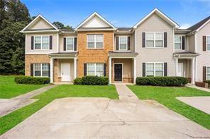 Charming 3 bedroom/2.5 baths END UNIT townhome! Super convenient neighborhood minutes from shopping, schools, restaurants, the airport, 285, Downtown, Walk to Marta Bus, Connect to Rail. The main level offers a separate Dining Room and Living Room-with sliding door access to the back yard. Spacious Kitchen with lots of cabinet space and view to the Living Room. New LVT flooring on main. Upstairs offers Master Suite (with walk-in closet and tray ceiling), 2 additional bedrooms, full bath and laundry closet.