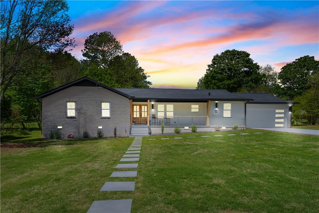 Welcome to your new Ranch home in the heart of Dunwoody, Georgia! Every inch of this 4-bedroom, 3-bath home home has been thoughtfully redesigned, with a busy family in mind. As you step inside, you're greeted by an open-concept floor plan flooded with natural light, highlighting the gorgeous real hardwood floors and high-end fixtures. The spacious living room flows seamlessly into a chef's kitchen, complete with custom cabinetry, top-of-the-line stainless steel appliances custom vent hood. The main level features a private, spa-inspired primary suite with walk-in closets and plus an en-suite guest suite. All baths with designer finishes, offering plenty of room for family or guest along with an abundance of storage. Special feature is the pet center designed for all your pet needs. Must see. Step outside from your large screened porch to a spacious back yard. Ideal for hosting summer gatherings or simply unwinding with a glass of wine. Located in a highly sought-after Dunwoody area with top-rated schools, shopping, and parks nearby, this home is move-in ready and waiting to welcome its next owner! Don't miss the opportunity to own this one-of-a-kind gem.