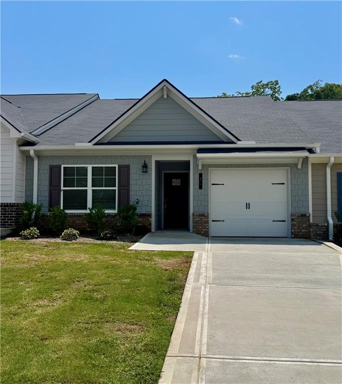 **Agent off Tuesday & Friday | 55+ Active Adult Community – Homesite 42 – Townhomes | MOVE-IN READY! QUICK MOVE-IN**
Step into the Acacia floor plan by Kerley Family Homes—a stunning, spacious ranch-style townhome from our beloved Bungalow Series, crafted for effortless one-level living in the sought-after Silver Leaf 55+ Active Adult Community. This 2-bedroom, 2-bathroom home perfectly balances comfort and style, featuring sleek granite countertops, a large kitchen island with bar seating, and stainless-steel appliances including a range, microwave, and dishwasher. Window blinds are already installed, so you can move in and feel at home from day one. The Acacia’s exterior charm shines with timeless cement siding and classic brick accents, while inside, every finish and fixture has been thoughtfully selected for modern living and ease. **This month only**, take advantage of our *$5,000 Save Your Way* incentive—put it toward closing costs or a rate buydown when using one of our preferred lenders (some restrictions apply).
Located in the heart of Dawsonville, you’ll enjoy being just minutes from scenic Amicalola Falls, the sparkling waters of Lake Lanier, and the North Georgia Premium Outlets. Plus, don’t miss out on community favorites like the Mountain Moonshine Festival. Every home comes with a Builder’s Warranty and an in-wall Pestban system for added peace of mind. HOA is $175/month. Covers more than most! **Homesite 42 is ready for you—schedule your tour today before this gem is gone!**