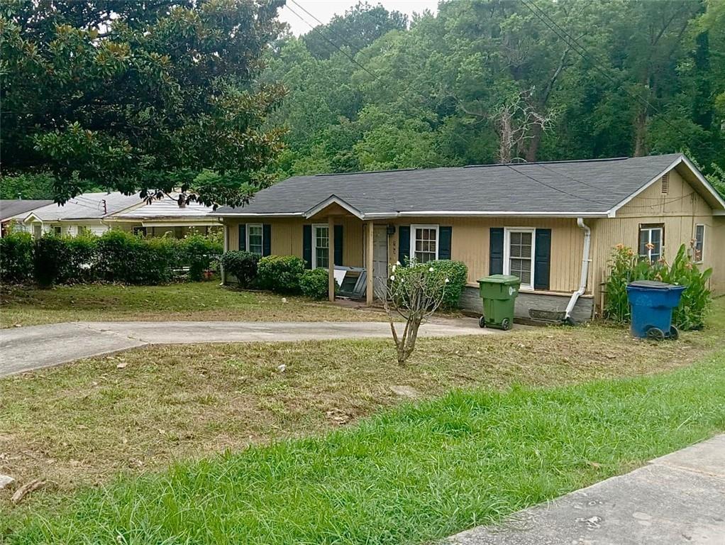 Investor opportunity! This home features 4 bedrooms, 2 full bathrooms, with a large bonus room, a large backyard with storage shed, and tons of potential for a great rental property or fix and flip. This home is nestled on a quiet street convenient to downtown, shopping, restaurants, and the interstate. Come see this gem today!