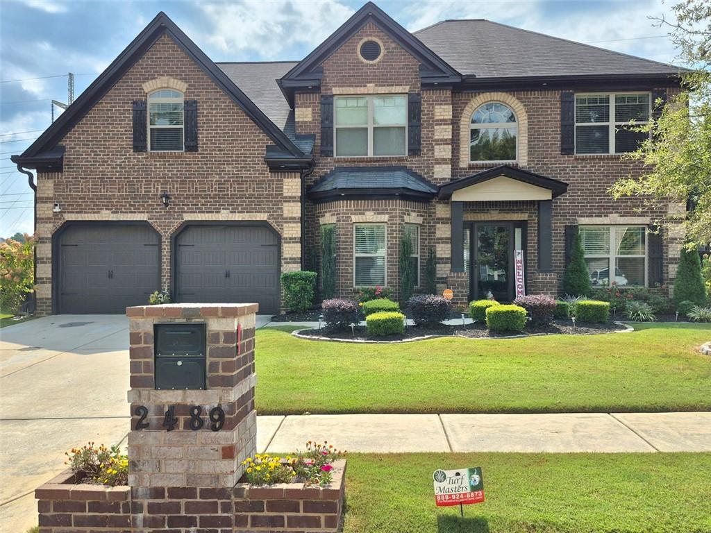 This showstopper has arrived with curb appeal that commands attention! As you approach, the first thing you will notice is its undeniable presence and charm. As dusk falls, the home takes on a magical quality with professionally installed exterior uplights that graze the architecture, highlighting its best features and creating a stunning nighttime silhouette.
Features include striking new interior lighting fixtures, a two-story foyer entry with a dazzling chandelier, granite countertops, all stainless steel appliances, a breakfast bar, and a family room with a fireplace that opens to the kitchen. Additional highlights are upgraded luxury fixtures, coffered ceilings, new hardwood floors on the main level, a tray ceiling in the formal dining room, an in-law suite on the main, his & hers closets, a double vanity, and a spacious yet elegant owner’s retreat with a lovely sitting area.
The private yard has been newly fenced and painted, creating your own outdoor sanctuary. A beautiful new shed provides practical storage, while an expansive new concrete patio extends your entertaining space. From there, your eyes are drawn to the elegant gazebo, standing as the centerpiece of the yard, and a custom paver stone walkway that gracefully guides you to the front door—hinting at the quality within. This same attention to detail is reflected in the immaculate landscaping in both the front and back yards. And let’s not forget—this chateau is a smart home, too.
No HOA… This home is the complete package and it’s calling your name.
Just minutes to I-20, I-285, and shopping.