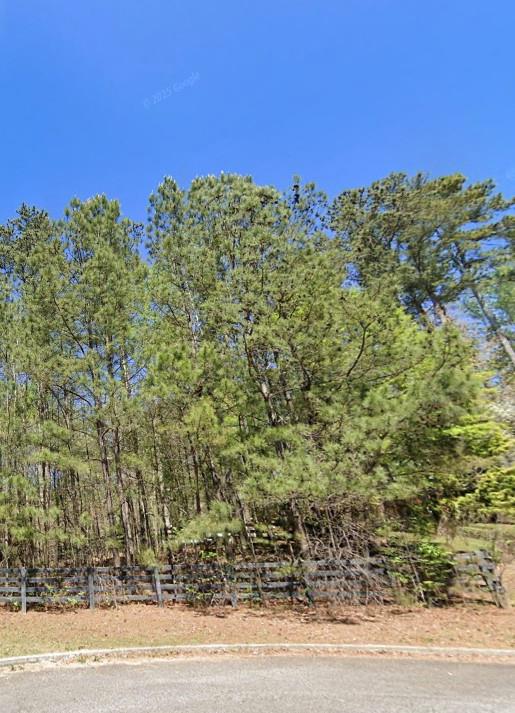 Luxury Custom Home Lot - Incredible opportunity to build your luxury dream home on 2+ acres or 6.52 acres (121, 124, & 126 Aaronwood Ct) in one of Alpharetta’s most desirable and private cul-de-sac locations. Nestled among mature hardwoods and natural landscape, this gently rolling lot offers the perfect canvas for a high-end custom estate with endless possibilities—whether you envision a sprawling modern farmhouse, a timeless Southern retreat, or a transitional masterpiece with resort-style outdoor living. With no HOA, you’ll enjoy full creative freedom to bring your architectural vision to life—add a pool, outdoor kitchen, guest house, or design for multigenerational living. The lot provides space, privacy, and flexibility rarely found in such a prime location.
Conveniently located just minutes from Downtown Alpharetta, Milton, Avalon, top-rated schools, and GA-400, this exceptional property blends the serenity of estate living with unmatched access to dining, shopping, and major commuter routes. Don't miss this rare opportunity to own and build in North Fulton County. Whether you're a buyer looking to create a forever home or a builder seeking a prime homesite, Aaron Wood Ct is ready to bring your vision to life.
Total land frontage for the land totals 164 Feet or lot average is . The parcels can be sold individually or as an assemblage of 6.52 acres. The property is in a subdivision where the last home sold for over $900K on a lot of 2.14 acres. Each lot has a different parcel number and legal description. Lot 6: 2.23 Acres 02N12 100; Lot 7: 2.15 Acres 02N12 101; Lot 8: 2.14 Acres 02N12 102