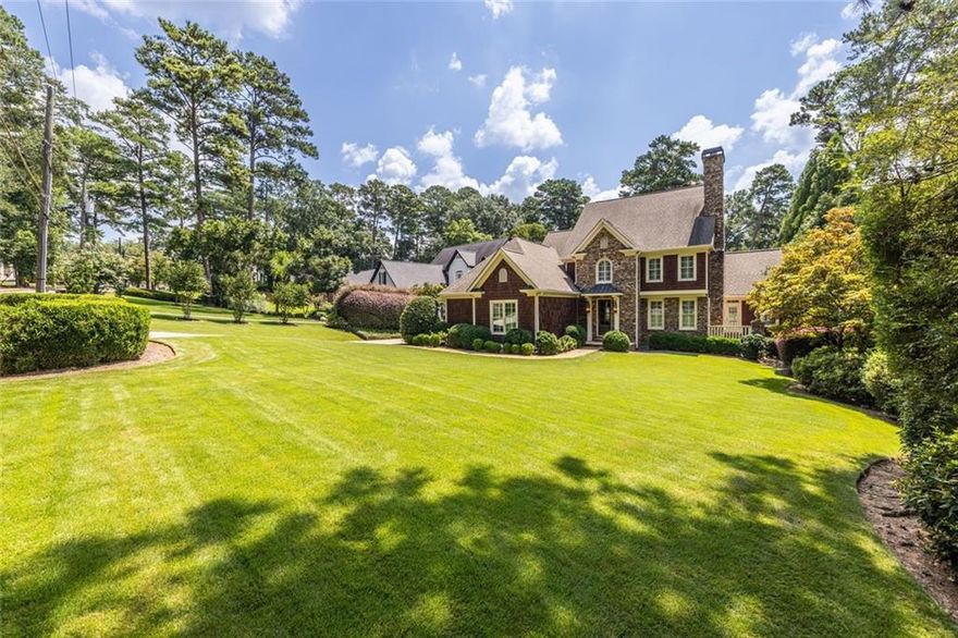 Nantucket Style, Nestled Among the Gorgeous Homes on Sheridan’s Prestigious Millionaire Mile.
Behind its timeless shake exterior, this custom-built home reveals a beautifully updated interior and more than 300 feet of landscaped grounds. The newly renovated kitchen—anchored by SubZero refrigeration, Thermador 6-burner range, and a suite of luxury appliances—flows into a vaulted family room with fireplace and 3-season porch, all overlooking a private backyard retreat with pool, spa, and outdoor kitchen.
The terrace level is designed for both entertaining and everyday living, complete with an oversized guest suite, flex room, wine cellar, and home theater. 
The private upstairs includes bedrooms and a flex/den space as well.
A rare blend of privacy and functionality, wrapped in classic style. All the relaxed elegance of the New England coast—translated to the heart of Atlanta. Think Nantucket charm meets Atlanta ease—an inviting retreat with timeless style.