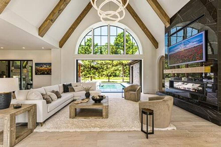 Exceptional opportunity to build your dream home in the heart of Alpharetta on a level 1 acre lot surrounded by gorgeous mature oak trees. Anker Custom Homes will guide you through the process of designing your dream home to include the perfect layout, features and finishes while managing to the desired budget. Home can be designed with or without a basement and will allow for a beautiful walk out to the main level back yard, perfect for a pool! Rare to find this perfect lot in the highly regarded Milton High School district, it will surely be idyllic oasis in an exceptional location.  Contact Anker Custom Homes for a friendly conversation about the possibility of making this your dream home! Images shown in listing are representative of builder's design and craftsmanship. Actual design and finishes can be completely customized to owner's preferences.