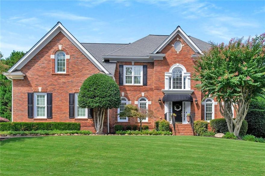 Welcome Home to this tastefully renovated 5 bed, 5 bath, 3-car garage home in the highly sought-after swim/tennis community of Chartwell! Newer HVAC and Newer Windows! This 4-sided brick beauty has a spacious main living level perfect for entertaining! A showcase eat-in kitchen complete with top-of-the line appliances (Wolf, Subzero, Bosch, Sharp), pot-filler, island, breakfast bar with beverage cooler, wall of windows, custom cabinets and adjacent sun-filled breakfast area. Walk out from the breakfast nook to find a fabulous vaulted covered deck with beautiful stone and brick wood-burning fireplace! Upstairs, you’ll find a beautiful primary bedroom with luxurious tray ceiling detail, newly renovated primary bath with dual vanities, enormous walk-in shower, and large custom walk-in closet! The full, finished walk-out daylight terrace level includes a large multi-purpose space, additional family room, media room, kitchenette with full refrigerator, microwave, sink and beverage cooler, and a full guest bathroom. Outside on the terrace level offers a large patio with both covered and uncovered areas, with upgraded convenient, low-maintenance epoxy coating. A fence enclosure makes this patio area private and pet-friendly! In addition this large lot sits in a quiet location between two cul-de-sacs and has plenty of useable yard space for fun and games! Chartwell community includes pool, tennis courts, clubhouse, playground, and a community lake, and is located just steps to Newtown Park, shopping, restaurants, and more! Easy access to GA 400! DON’T WAIT, be sure to schedule your showings ASAP!