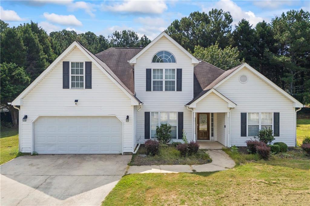 Discover modern and affordable luxury in this beautifully updated 5-bedroom, 2.5-bathroom home featuring LVP flooring throughout. Perfectly located just minutes from Main Street Loganville in one direction and Main Street Snellville in the other, this home offers both style and convenience, plus community swim, tennis, and playground amenities.
Step into the bright, vaulted living room with abundant natural light and a cozy gas fireplace. The chef’s kitchen showcases sleek upgraded granite countertops, a gas cooktop with a range hood, a double oven, and all stainless steel appliances—perfect for everyday living or entertaining.
The main-level primary suite offers a trey ceiling, crown molding, a spacious walk-in closet, and a spa-inspired en-suite with a separate tub and shower, double vanity, and plenty of space. Upstairs offers four oversized bedrooms and another full bath.
Snellville is booming with new restaurants, breweries, a town green with plenty of activities and festivals, concerts, and a new library. Loganville features a toddler park, a town green with lots of community events, and even more shops and restaurants—so you are surrounded by constant entertainment in every direction. The neighborhood is well-maintained and highly sought after.
Set on a flat, private half-acre lot, the backyard is perfect for outdoor activities, gardening, or simply relaxing. The home is ready for your custom touches, and the seller is motivated, welcoming discussions with any interested buyers.