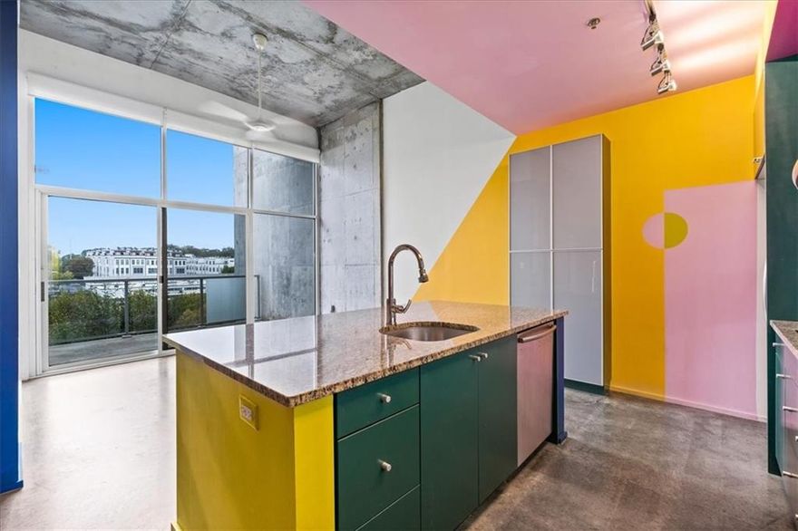 Creative's retreat in the sought after Arizona Lofts 2 (AZ2) Condominiums on the cusp of Kirkwood and Edgewood. This incredible top floor corner 1 bed/1 bath unit offers 800 square feet of living space, has custom designer touches throughout and has been featured in national publications like Architectural Digest and Domino Magazine. Open plan living at its finest, the beautiful kitchen with large center island, stainless steel appliances, stone counters and custom tile work overlooks the light flooded living space with floor to ceiling windows with access to the private balcony with tree top views of the city as well as the separate dining space. The generously sized bedroom has a large walk in closet with custom built ins and the laundry closet outfitted with a full size stackable. The luxurious spa-like bathroom offers a gorgeous standalone soaking tub, an oversized shower and a separate water closet. AZ2 has world class amenities including a stunning pool with cabanas, club room, fitness facility, dog park and roof top patio and is conveniently located within walking distance to shops, restaurants, trails, parks and the Edgewood Marta line. 1 gated parking spot included.