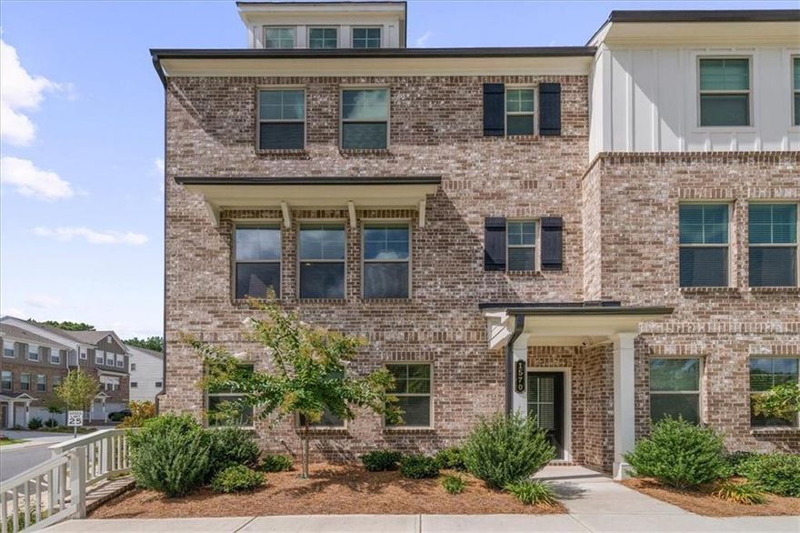 Welcome to 1570 Halbrook Pl. SW located in beautiful South Cobb! This end unit townhome is move in ready! Only 1 year with plenty of upgrades! As you enter the the home, you have a welcoming entry foyer. There is a full guest suite with full bath on the main level of the home, as well and the 2 car rear entry oversized garage. The second level of the home features an open concept family room with fireplace, eating area, and beautiful kitchen with plenty of cabinet space, granite countertops, and a large walk in pantry. There is also access to the oversized rear deck. There are tons of windows on for lots of natural light. Upstairs features an additional guest bedroom with private bath and walk in closet, full laundry room, and the primary suite with private bath, and walk in closet. The primary bath has double sinks, a private toilet room, and walk in shower. This unit has beautiful floors, great accent walls, and beautiful lights and fans through out. Faux wood blinds through out. Level private driveway. Easy walk to the community mailboxes, and firepit area. You are close to HWY 285, Truist park, Cobb Galleria, Cumberland Mall, and so much more! Call today to learn more about this great home!