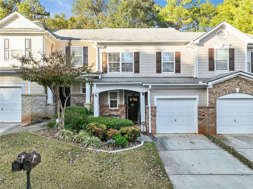 Beautifully maintained townhouse in sought-after Stone Mountain! This light-filled 3-bed, 2.5-bath home offers an open and inviting layout perfect for entertaining or relaxing. The spacious kitchen overlooks the dining and living areas, creating a seamless flow throughout the main level. Upstairs, the large primary suite features a private bath and generous closet space, with two additional bedrooms ideal for guests, office, or flex use. Enjoy low-maintenance living and a convenient location just minutes from Stone Mountain Park, historic Stone Mountain Village, Wade-Walker Park, shopping, dining, and easy access to Hwy 78 and I-285. Move-in ready and full of charm . Come see why this one stands out!
