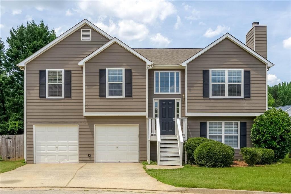 Welcome to your beautiful home located in Acworth! This 5 bed 3 bath home is one of the largest floor-plan offered in the subdivision! It has it all from hardwood floors throughout the main level, the spacious kitchen has ample counter space and stainless steel appliances, large bonus room downstairs perfect for home office or man cave! The list goes on! Neighborhood amenities include a clubhouse, swimming pool, tennis courts, and playground. Awesome location near shops, restaurants, KSU, and I-75. HOA Fee is included in the monthly rent.
