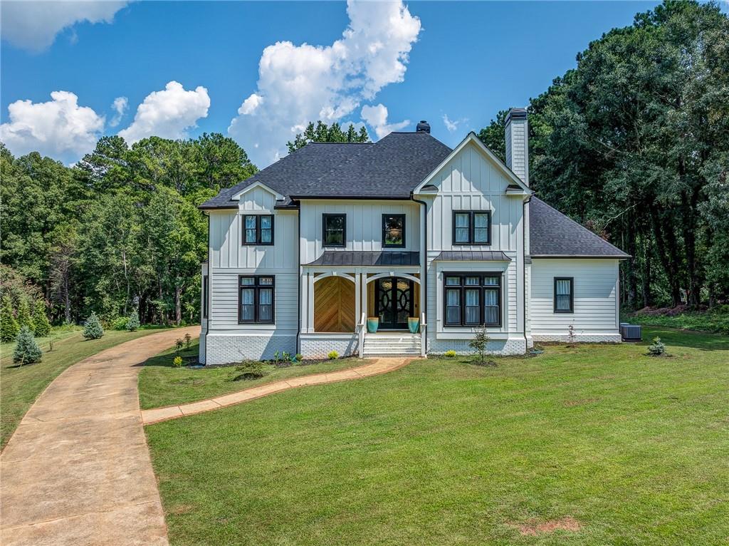 Welcome to your private oasis nestled on 2.6 acres of pristine land, where modern luxury meets everyday comfort. This stunning 4-bedroom, 3-bathroom estate has been fully renovated and reimagined with high-end finishes and thoughtful details throughout.
From the moment you enter the two-story foyer and soaring living room, you’ll be captivated by the elegance of the new modern lighting package, custom wrought iron railings, and the seamless flow of natural light.
The gourmet kitchen boasts a 6-foot cascading natural stone island with custom backsplash, retractable bi-fold doors for indoor/outdoor living, and an open concept perfect for gatherings.
The luxury owner’s suite is a true retreat, featuring a beautiful fire place, a spa-inspired bathroom with a freestanding soaking tub, a three-head steam shower, bidet, a custom walk-in closet designed to impress, and a private screened in deck for relaxation on a calm morning or after a long work day.
Step outside to a massive new deck with custom outdoor lighting, ideal for entertaining guests while overlooking your beautifully manicured lawn. Off the front porch you’ll enjoy newly planted landscaping to include Japanese Maples, Weeping Willows, and Blue Spruce Pines.
Car enthusiasts will love the 12-car detached garage (with new roof) in addition to the 2-car attached garage, providing ample space for collections, hobbies, or storage.
Recent Upgrades Include:
? New roof on both main home & detached garage
? New Exterior and Interior Paint
? All Newly renovated bathrooms (tile, tub, toilets, vanities)
? New carpet throughout
? Four fireplaces with updated tile
? New septic tanks & foundational support system by AquaGuard
? New sump pump & drainage system
? Replaced HVAC system
? Bluetooth bathroom vents
? New exterior siding, doors, and added exterior lighting
? Interior tube slide for fun & functionality
This home truly has it all. Luxury, land, and lifestyle.