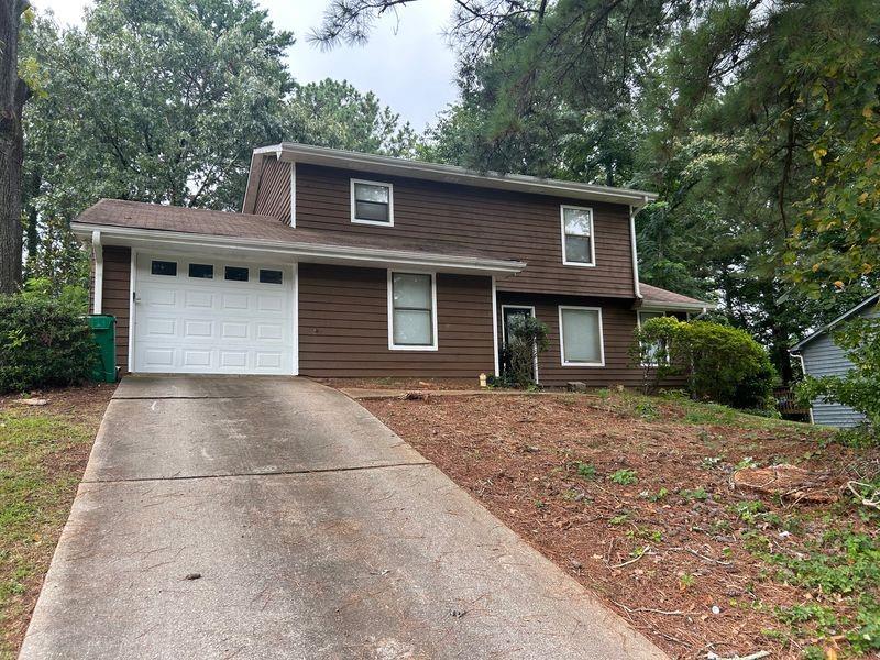 This charming 4-bedroom 2.5-bath home is perfect for a growing family, first-time homeowners, or investors seeking to expand their portfolio. Nestled in a quiet neighborhood, the modest home offers a functional kitchen with an eating area which looks into the family room. A separate dining room sits off the other side of the kitchen towards the front of the home. Three full size bedrooms with two full baths sit on the upper level. This home is the ideal starter or rental property with strong investment potential.