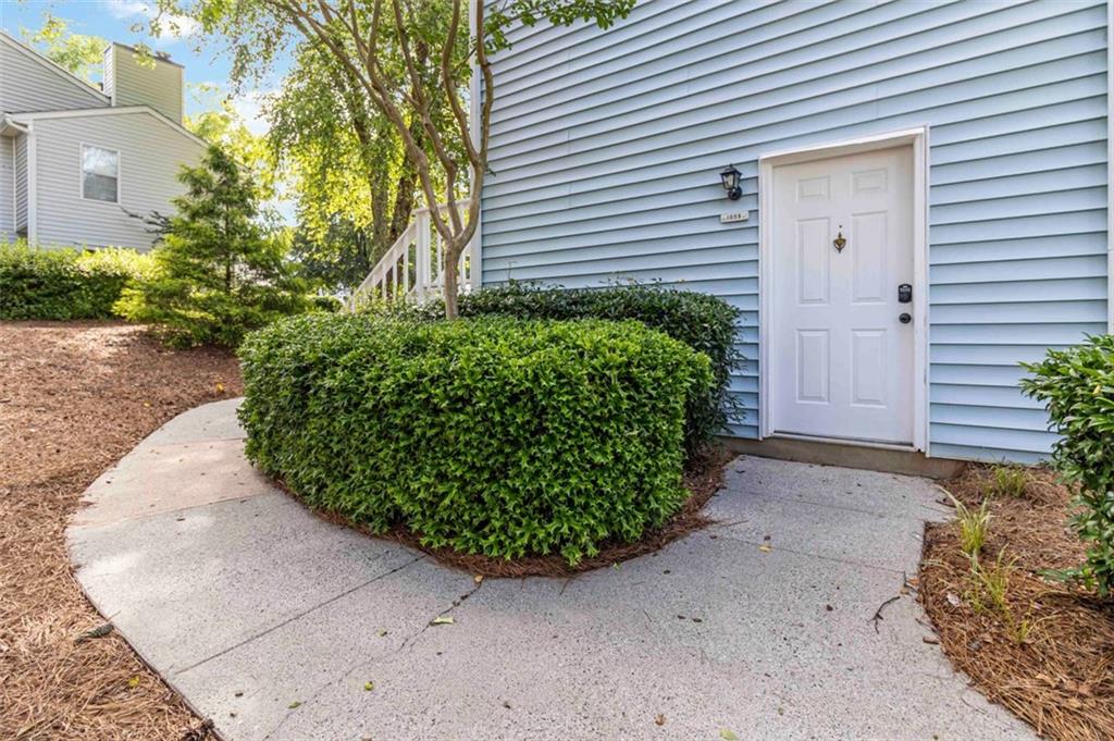 Welcome to this prime Location and Rare Garden-Level Condo in Peachtree Corners.
This beautifully updated and well-maintained one-bedroom, one-bath condo includes a flexible bonus room that provides the functionality and versatility of a two-bedroom home. Located on the garden level with no steps, this condo offers easy access and is filled with natural light throughout.
The spacious primary suite features a walk-in closet and a private balcony overlooking a peaceful garden area.
The bonus room is perfect for a guest space, home office, or cozy TV room. The home includes a modern kitchen, updated bathroom, and stylish flooring, with thoughtful upgrades throughout for added comfort.
This unit is ideally located across the street from the pool and tennis courts, making it easy to enjoy the community amenities..
An assumable loan at 2.75 percent is available for qualified buyers, offering an outstanding opportunity in today’s market.
Community amenities include a sparkling swimming pool with waterfall, two tennis/pickleball courts, a cabana with grill area, and dog-walking spaces. The condo is just minutes from the Forum and conveniently located near Marta, major highways, and a variety of shopping and dining options.
This listing has been virtually furnished.