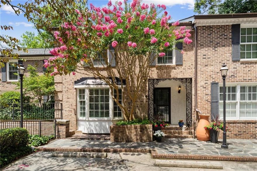 Old world charm in the heart of Buckhead’s Ardmore Park neighborhood! Turn-key, fully renovated homes for under $600k rarely come available in this coveted location. The large main floor is suited for easy entertaining with multiple living spaces, dining room, and updated kitchen boasting high-grade cabinetry, stone countertops, and stainless steel appliances. Timeless details like the hardwood floors, heavy moldings, and built-ins flanking the fireplace create a warm and welcoming atmosphere. Separated from the social spaces below, all bedrooms are upstairs creating a private and intimate escape. The primary suite boasts ample closet space with custom California Closets shelving, more built-in cabinetry, and a private en-suite bathroom featuring dual vanities and an oversized tile shower. Two sizable guest bedrooms, an updated hall bathroom, and a large linen closet complete the top floor of this home. The terrace level is ready for a party! Large bonus rooms and a new custom wet bar set the stage for at-home fun. Outside, the screened porch and open air deck ensure year round options for al fresco dining and end of day relaxing. This boutique community of 12 townhomes offers a swimming pool, ample parking, and direct access to the Tanyard Creek Trail, connecting to the Atlanta Beltline. Enviable address is moments from the best shopping and dining destinations in Buckhead and Midtown, while zoned for highly-acclaimed schools. Commuters will rejoice in the close proximity to highways and easy access to Atlanta’s renowned international airport. Welcome home to 11 Ardmore Square, where life is good and living is easy!