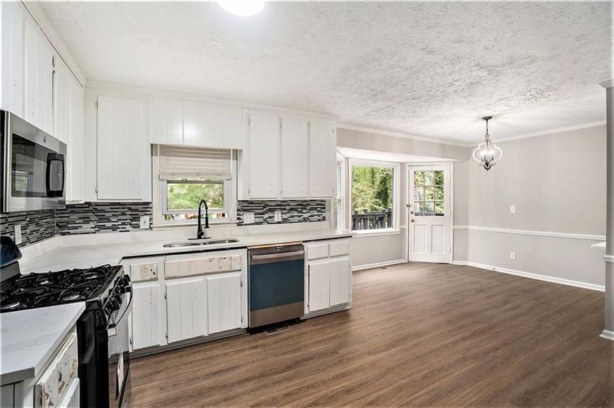 This beautiful 4-bedroom, 3-bathroom home sits on a spacious corner lot in the desirable East Cobb area. The open-concept living space flows seamlessly into a modern kitchen with granite countertops and stainless steel appliances. The master suite boasts a walk-in closet and a luxurious en-suite with dual vanities and a separate tub. Enjoy the private backyard with a deck, perfect for outdoor gatherings. Located near top-rated schools, shopping, and dining, this home offers comfort and convenience. Schedule your tour today!