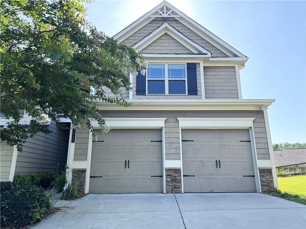 One of the largest units in the neighborhood and great lot located directly across from pool and tennis. This end unit offers an open floor plan perfect for entertaining. Kitchen features granite countertops, island and upgraded cabinetry overlooking dining and family room. Beautiful rich, dark-toned engineered hardwood floors throughout the main living area. Huge master retreat w/ separate sitting area, generous master closet and a beautiful bath. Spacious secondary rooms feature large closets. Loft area perfect for office or study with access to balcony. Washer/Dryer included, and laundry room located on 2nd level. Spacious 2 car garage.