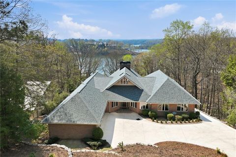 Spacious single-family residence with panoramic lake views, featuring a modern architectural design and landscaped driveway, located in Gainesville, GA, near Lake Lanier.