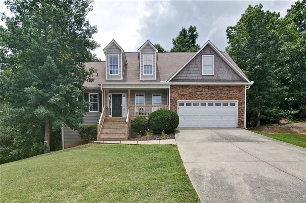 SPACIOUS 6 BEDROOM 3 BATH 3 STORY HOME. SITS ON A PRIVATE .91 ACRE CUL DE SAC LOT BACKING UP TO 120 ACRES OF FOREST LAND. EXCELLENT FAMILY FRIENDLY NEIGHBORHOOD WITH NO HOA RESTRICTIONS. RECENTLY REPLACED FRONT PORCH AND REAR DECK EXPANDING THE ENTIRE BACK OF THE HOME. VERY PEACEFUL AND PRIVATE BACKYARD HAS TRAILS, A CREEK AND FOREST LAND TO GO EXPLORING ON YOUR ATV. LAKES, GOLF, BARNSLEY RESORT AND LAKEPOINT SPORTS COMPLEX ARE NEARBY. CONVENIENTLY LOCATED IN BETWEEN CARTERSVILLE & CALHOUN. MOST OF THE BASEMENT IS DRY-WALLED & FLOORED OFFERING ADDITIONAL LIVING SPACE WHICH COULD BE MORE LIVING ROOM, GAME ROOM, OR AN IN-LAW OR TEEN SUITE WITH PRIVATE ENTRANCE. A BATHROOM COULD EASILY BE ADDED AS WELL. THERE IS A STORAGE OR WORKSHOP AREA BEHIND THE FINISHED SPACE. CURRENTLY BEING SOLD EITHER AS A FULLY FURNISHED AIRBNB OR END USER DESIRING TO MAKE IT THEIR FOREVER HOME.