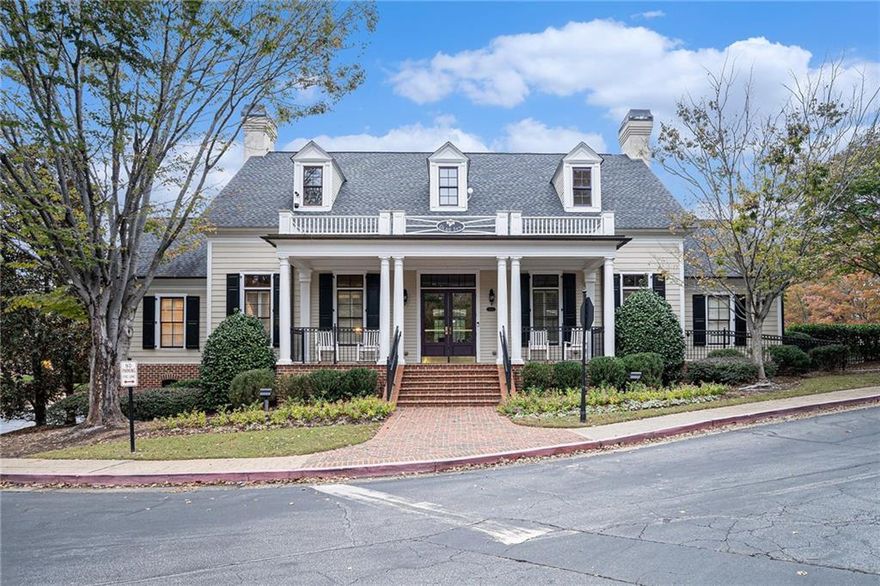 Do not miss this gorgeous condo that’s very well maintained with open floor plan, hardwood flooring and a private, peaceful, wooded view. This building has no steps to climb to the front door, plus there is an elevator down to the parking garage making this place truly "Living with no stairs". Spacious kitchen with all appliances replaced during their ownership. Kitchen features stainless steel appliances, granite countertops, tile backsplash, stained cabinetry, recessed lighting, breakfast bar, and built in Microwave. Open concept formal dining room. Large great room with built-in shelving, decorative columns, and marble fireplace with gas logs. Large master bedroom with built-in shelving, crown molding, access to the private balcony and spacious walk-in closet. Master bathroom features tiled flooring, double vanity, glass framed tile shower and whirlpool tub. Spacious secondary bedroom with great closet space. Bonus room works well for an office or separate TV room. This unit comes with an assigned parking spot along with a storage closet and Tesla charger which is universal allowing other EV cars to be charged. The washer, dryer and refrigerator will be staying.  The rental cap for this complex is 25% and it's currently at less than 14%. Great clubhouse community activities include a Book club and Football game brands. This is a very popular gated community with great amenities, including a large swimming pool, fitness center, walking trails and in a great location within minutes of 285, I-75, Atlanta and airport.