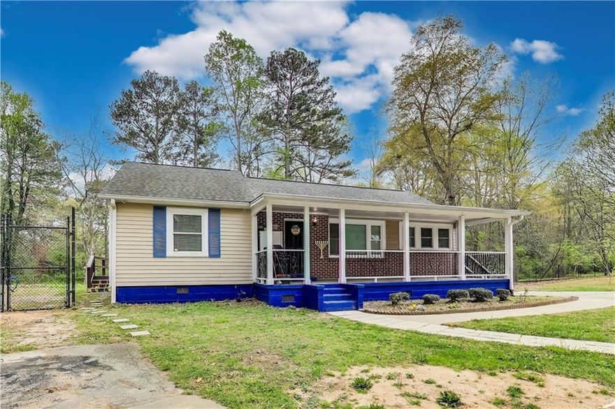 Spacious & Renovated 4 Bedroom Home on .77 Acres in Prime Marietta Location! Welcome to this beautifully renovated home in a prime Marietta location near Smyrna! Sitting on .77 acres, this property offers tons of space both inside and out, making it perfect for families, entertaining, and privacy. As you arrive, you'll love the huge front yard, circular driveway for multiple vehicles, and the big front porch perfect for relaxing. Being the last home on the street, you'll enjoy peace and privacy. The fenced backyard has two storage sheds and has been mostly cleared, offering endless possibilities for outdoor fun. Plus, two porches on each side of the home provide great spots for summer barbecues! Step inside to find a completely renovated interior with recessed lighting throughout, hardwood floors, and updated fixtures. The stunning kitchen features quartz countertops, a stylish backsplash, stainless steel appliances, and beautiful cabinetry. The bathrooms have been fully updated, with luxury vinyl flooring, a new vanity, and a ceramic tile stand up shower. The home offers 4 spacious bedrooms and 2 baths, with the master conveniently located on the main level. There are also two living rooms, one of which could easily be converted into another bedroom. Other key features include: 8 year old roof in great condition, Up to date A/C maintenance, 2 year old water heater, Cement siding in excellent shape & Crown molding & fresh paint throughout. Located just 3 minutes from all your favorite restaurants and stores, this extremely well maintained home offers the perfect mix of space, privacy, and convenience. Don't miss out! Schedule your showing today!