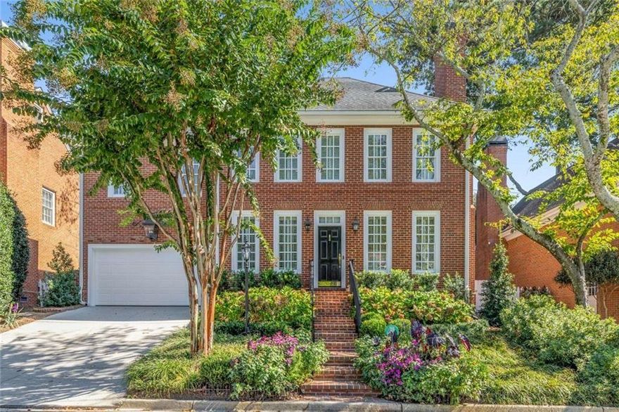 Absolutely stunning, this all-brick traditional home is nestled in the quiet, sought-after Village at Lenox Park—perfectly positioned between Buckhead and central Brookhaven. Fully renovated by one of Atlanta’s top designers, every detail has been thoughtfully curated for comfort and style.

Step inside to a welcoming two-story foyer and discover hardwood floors, ten-foot ceilings, and plantation shutters throughout the main level. The spacious living room features a cozy gas fireplace and mantel, while the elegant dining room offers a picturesque bay window view of the professionally landscaped, walled, and gated backyard and patio. The chef’s kitchen is a true showpiece, boasting granite counters, custom cabinetry, a beverage center, double ovens, warming drawer, farmhouse sink, and premium Wolf and Sub-Zero appliances. A formal powder room and extra storage complete the first floor.

Upstairs, the open staircase with luxurious wool carpeting leads to a generous master suite with a large walk-in closet, abundant natural light, and a spa-inspired bath with soaring ceilings, double vanities, a freestanding tub, and a lavish shower. Two oversized secondary bedrooms feature ample closet space and share another beautifully renovated full bath. The laundry is conveniently located upstairs.

Enjoy outdoor living in the fully irrigated, professionally landscaped backyard with a large brick patio and a handy storage building. The spacious two-car-plus garage is professionally sealed, offers plenty of storage, and features automatic doors. This is a true turnkey opportunity—meticulously cared for, inspected, and serviced, ready for you to move in and enjoy.