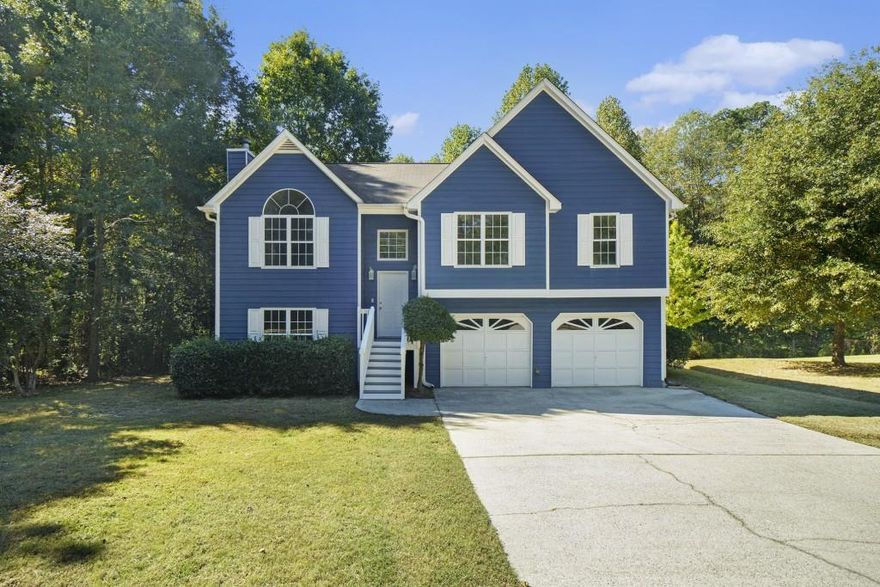GREAT FLOORPLAN WITH IN-LAW SUITE!! HOME HAS BEEN REMODELED AND READY TO MOVE IN! THERE IS NEW CARPET, NEW VINYL PLANK FLOORING, NEW INTERIOR PAINT &  NEW LIGHTING THROUGHTOUT! THE HOME HAS A LARGE VAULTED LIVING ROOM WITH PALLADIAN WINDOW AND TILE FIREPLACE. THE DINING AREA IS OPEN TO THE KITCHEN & LIVING ROOM AND HAS VINYL PLANK FLOORING. THE SPACIOUS KITCHEN HAS A PASS THROUGH WINDOW TO THE LIVING ROOM, A PANTRY AND NEW GRANITE COUNTERS WITH AN UNDERMOUNT STAINLESS STEEL SINK. THE HALLWAY THAT LEADS TO THE BEDROOMS ON THE MAIN LEVEL IS WIDE AND SPACIOUS AT THE END AND HAS ROOM FOR A DESK IF YOU PREFER. THE MASTER BEDROOM IS HUGE WITH A TREY CEILING AND LARGE WALK-IN CLOSET. THE MASTER BATH HAS A DOUBLE VANITY WITH NEW GRANITE COUNTERS, NEW VINYL PLANK FLOORING, GARDEN TUB AND SEPARATE SHOWER. THE TWO SECONDARY GUEST BEDROOMS ON THE MAIN LEVEL ARE SPACIOUS AND SHARE A HALL BATH WITH NEW VINYL PLANK FLOORING, NEW GRANITE COUNTERS AND A TUB/SHOWER COMBINATION. IN THE BASEMENT YOU WILL FIND, THE LAUNDRY CLOSET, A STORAGE CLOSET UNDER THE STAIRS AND A 2 CAR GARAGE WITH LARGE STORAGE AREA AND 2 NEW AUTOMATIC DOOR OPENERS. THERE IS A VERY LARGE BEDROOM IN THE BASEMENT WITH A WALK-IN CLOSET. IT ALSO HAS A CONNECTING FULL BATH THAT HAS A NEW GRANITE VANITY, TILE FLOORS AND A TUB/SHOWER COMBINATION. OFF OF THE BEDROOM, IS ANOTHER ROOM WITH NEW CARPET THAT COULD BE A SITTING AREA OR OFFICE. ON THE EXTERIOR OF THE HOME IS A FRESHLY STAINED DECK FOR ENTERTAINING GUESTS AND GRILLING. THE YARD IS VERY LEVEL AND THE BACKYARD BACKS UP TO WOODS. THIS HOME IS A MUST SEE AND WON'T LAST LONG! GREAT LOCATION!
