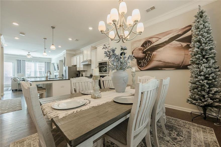 MUST SEE This immaculate, Move-in-Ready Town home is just what you looking for. For qualifying borrowers I have a local lender who can offer an interest rate of 2% below market the first year and 1% below market for the second year loan product! This home is conveniently located in the Heart of Alpharetta with easy access to Northpoint Mall, Avalon, Marriott, and all the best shopping, restaurants & schools nearby. You’re going to love the elegant & inviting modern design.  Step into the stylish layout of the bright & airy MAIN LEVEL with its soaring ceilings but stay cozy with the gas-started fireplace in main living area - Step out onto the balcony for even more entertaining potential.  The gourmet eat-in, open-concept, chef’s inspired kitchen features gorgeous, oversized island & breakfast bar, sleek, stainless-steel appliances, a fridge that stays, plenty of white cabinets & ample granite counter workspace, dual ovens, and butler’s pantry.  UPSTAIRS you have the primary ensuite featuring dual vanities, classy custom shower with glass doors, a bench seat, walk-in-closet & private toilet. There is also a spacious secondary bedroom with full hall bath, a laundry room, and attic access for more storage space with disappearing stairs.  Plus, a sizable loft which could easily be converted into another bedroom if desired.  Downstairs you have a media bonus room or even potential future bedroom with a half bath, coat closet, 2 car garage & 2 car driveway for extra guest parking. The local Community Offers a Pool, Excellent top-rated schools, plus Alpharetta’s thriving amenities & active lifestyles like — dynamic shopping, fine dining, parks, and convenient access to major tech companies, all nearby.  Ask about buyer’s incentives and TOUR TODAY Before it Gets Away!