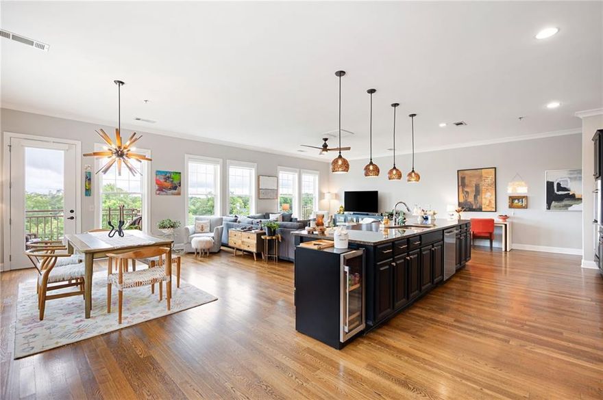 Experience elevated living in this one-of-a-kind penthouse, the only one in the building and a true top floor end-unit that spans from front to back — offering uninterrupted views in both directions. Start your day with sunrise on the rear walk-out balcony facing the peaceful mountains, and unwind with sunset views from the front balcony overlooking the vibrant City of Woodstock. This luxury condo is packed with over $100,000 in high-end upgrades and offers a lifestyle that’s second to none in the heart of downtown Woodstock. With abundant storage, upgraded lighting, and thoughtful design details, this home has it all.
Designed for entertaining, the open-concept living space features a chef’s kitchen with a massive 12’ x 4’ island, walk-in pantry, and premium finishes throughout. The private primary suite is a true retreat, complete with a spacious 15’ x 6’ walk-in closet and a spa-inspired bath that includes a soaking tub, separate shower, and dual vanities. The guest bedroom is also a private suite, offering a full bath and an oversized closet, perfect for guests or a home office.
Located just steps away from Woodstock’s amphitheater, shops, restaurants, and Greenprint Trails, this penthouse puts you at the center of it all. Voted one of Money Magazine’s Top 50 Places to Live, Woodstock offers a vibrant, walkable community — and this is your chance to live right in the middle of it. This penthouse truly delivers the WOW factor — don't miss it!