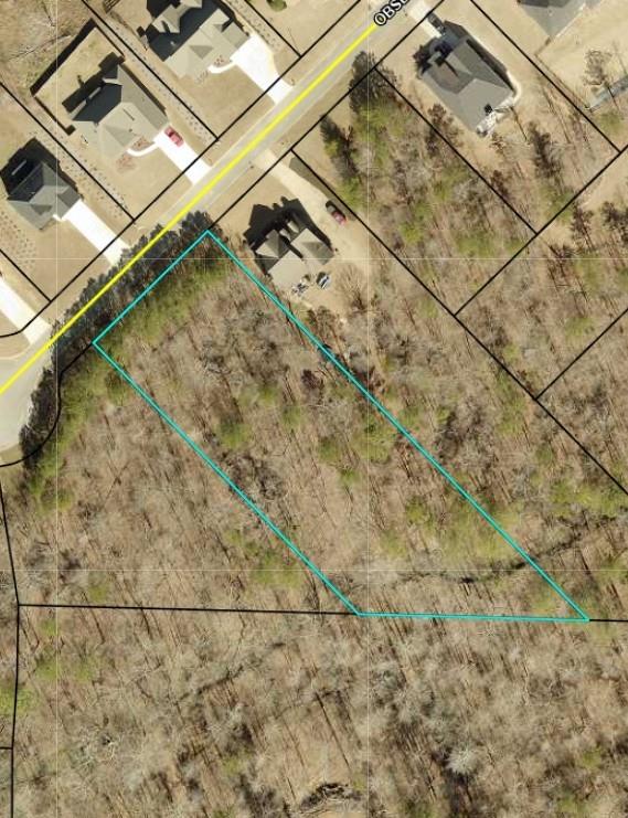 Are you looking for the chance to build a custom home with the luxury of already established amenities? Well, this is it! Over an acre of land to do with as you choose in a beautiful well established neighborhood in the heart of North Paulding. Enjoy the small creek that runs through the back of the property or jump in the car and head over to the amazing High Shoals Falls. Only minutes from all the fun in Downtown Dallas! Also available is 181 Observation Pointe. Both lots can be sold together.