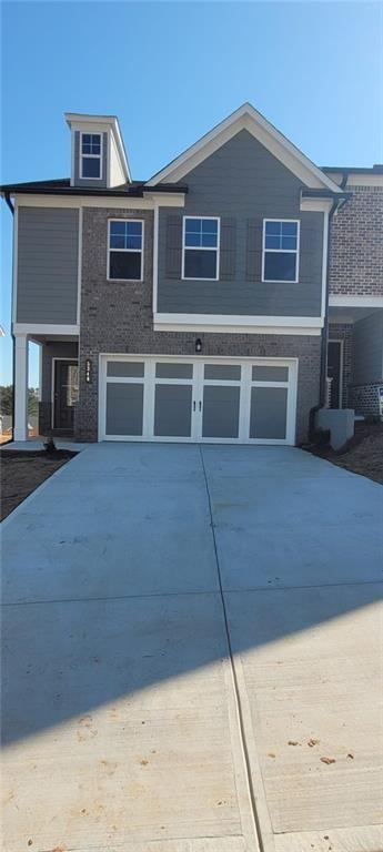 Brand new townhome. Located in close proximity to Gainesville, Flowery Branch and lake Lanier. Gorgeous kitchen with white, 42-inch shaker wall cabinets with crown molding, granite countertops, and an under-mounted stainless steel sink. Top of the line stainless steel appliances including a brand new range, dishwasher, microwave, washer, dryer, French door refrigerator, and water heater. Primary bath includes standing shower and tub. Oversized Primary bedroom along with 3 good sized bedrooms. This property has the individual garage with 2 covered spaces, driveway and common parking areas providing ample parking for you and your guests. Added bonus, is the amazing view from the yard. A pet fee of $500 per pet applies. Only small dogs up to 50 pounds are acceptable.